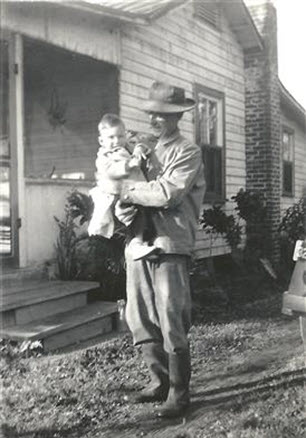 Walter G Wood holding grandson Walter D in Fellsmere FL 1947